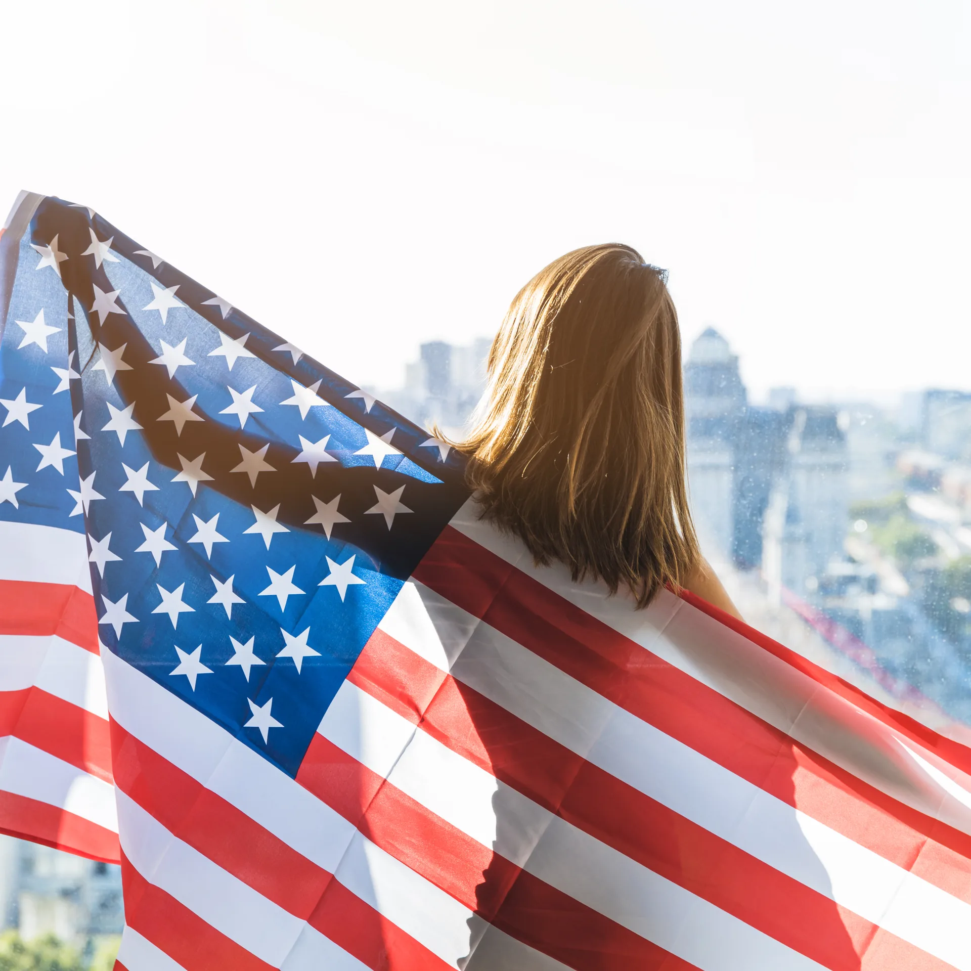 woman wrapped american flag
